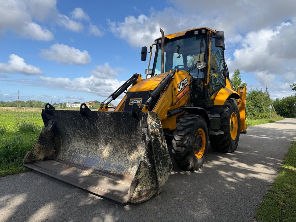JCB 3CX 4x4 enganche rápido, clima — foto 1 de 16